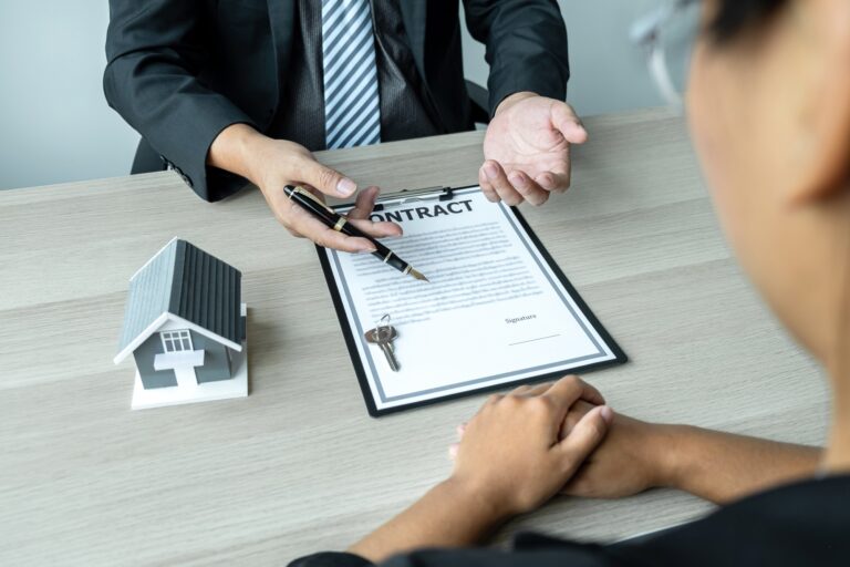 sale estate agent are presenting home loan to customer to decision signing contract to rental house